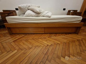 letto singolo con comodino