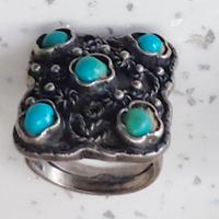 Anello in argento 925 con pietre turchesi