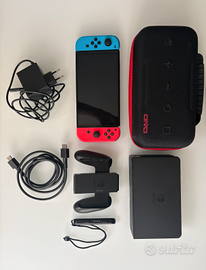 NINTENDO SWITCH OLED ORIGINALE + PORTASWITCH