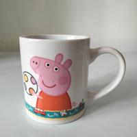 TAZZA+ LIBRO PEPPA PIG