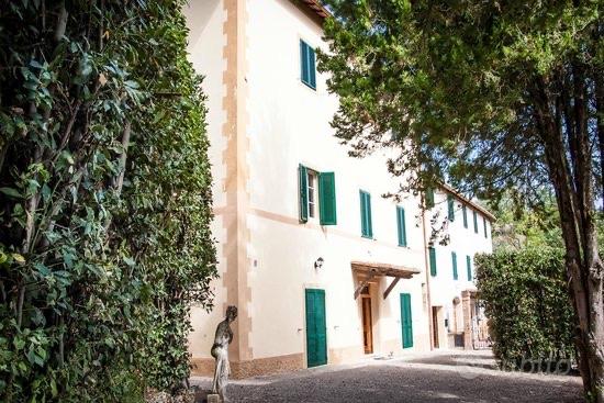 Villa con camere con spazi in comune