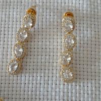 orecchini e bracciale bigiotteria dorata