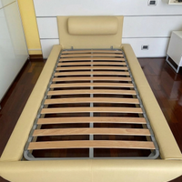 Letto singolo di design imbottito con rete a doghe