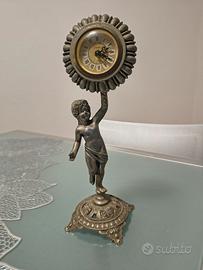 Orologio da tavolo con putto