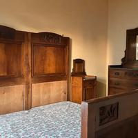 Letto matrimoniale in legno antico