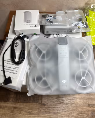 Dji neo + batterie +caricabatterie+care refresh