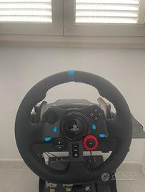 Volante con base +pedali giochi playstation