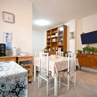 Trivano al piano terra con posto auto