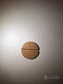 Gettone telefonico 7706