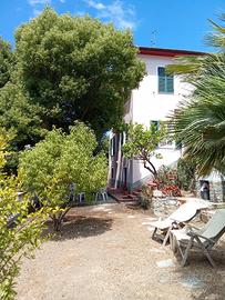 Casa con giardino
