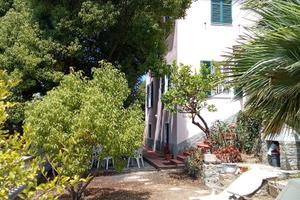 Casa con giardino
