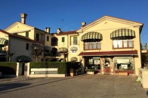 NEGOZIO A CARBONERA