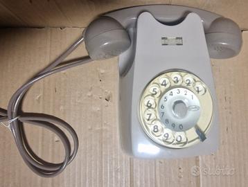 Telefono a disco grigio modello da muro Si