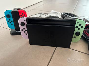 Nintendo switch con 4 joystick e accessori vari