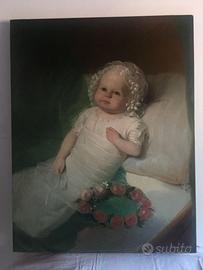 ritratto di neonato con corona di rose