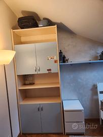Cameretta e mobile libreria