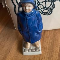 Royal Copenhagen bimbo con impermeabile blu nuovo