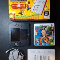 Nintendo 2ds + caricatore + scatola + giochi