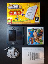 Nintendo 2ds + caricatore + scatola + giochi