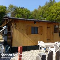 Roulotte stanziale con casetta in legno