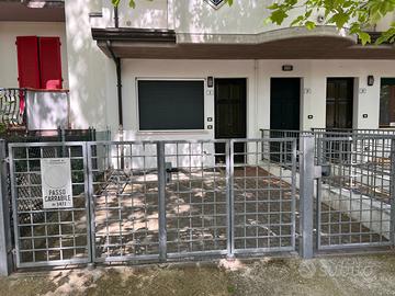 Bilocale con Giardinetto Recintato e Posto Auto