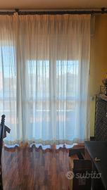 Tende in cotone con anelli in legno