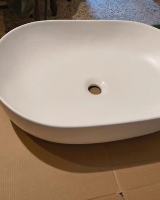 Lavabo da appoggio ovale in ceramica bianca lucida