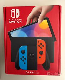 Nintendo Swicth OLED + 3 giochi + custodia