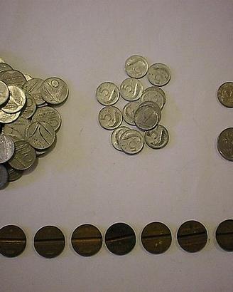 Monete da 5,10,20,50,100 lire e gettoni telefonici