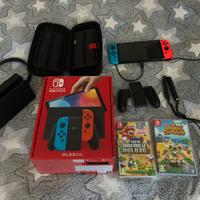 Nintendo Switch OLED + 2 Giochi + Accessori