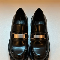 Mocassini in pelle nera lucida