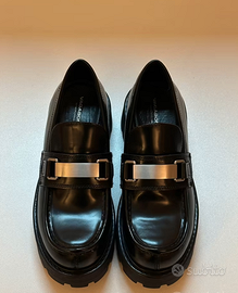 Mocassini in pelle nera lucida