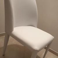 Sei poltroncine in ecopelle per sala.