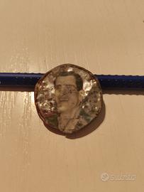 dischetto in metallo con Artemio Calzavara