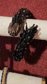 Bracciale rigido in pelle nera con cristalli