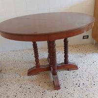 Tavolo rotondo in massello legno scuro .