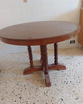 Tavolo rotondo in massello legno scuro .