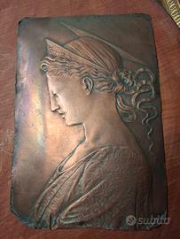scultura bassorilievo in rame