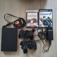 PlayStation 2 con due controller , alimentatore , 