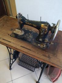 macchina da cucire con base 