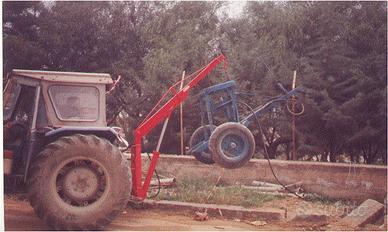 Gru idraulica,ripper per trattori a ruote ,cingoli