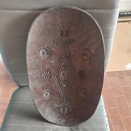 schiumarola in legno e sassola sarda