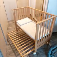 Culla con materassino e cuscino