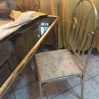 Camera da pranzo con tavolo sedie in oro zecchino