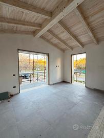 Villetta a schiera con giardino