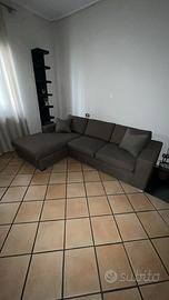 Divano letto angolare in tessuto grigio