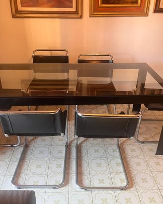 Tavolo in vetro con sei sedie in pelle modernariat