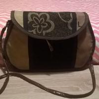 Borsetta fatta a mano in pelle e tessuto