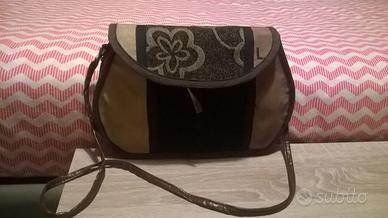Borsetta fatta a mano in pelle e tessuto