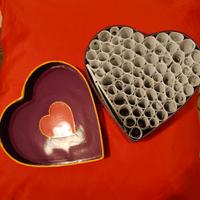 cuore con fogliettini erotici